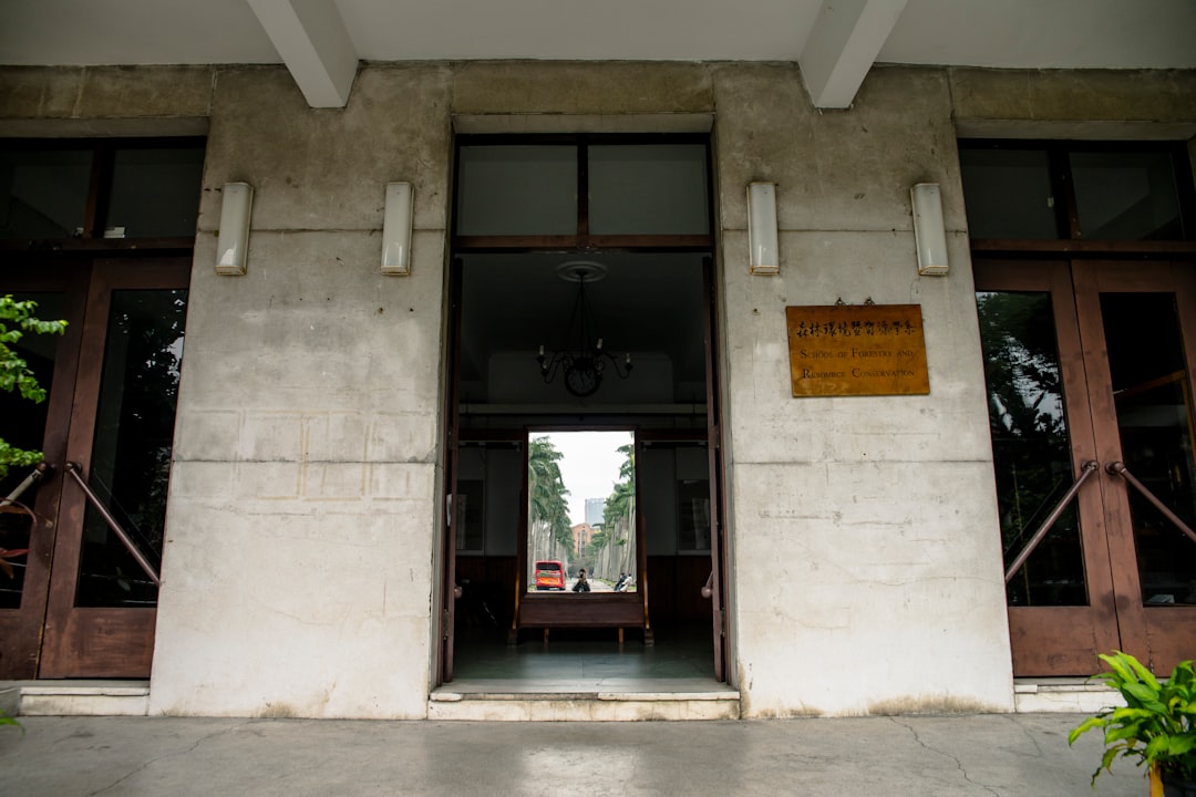 the entrance to a building with two doors